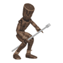 Crouches in cover - with a staff