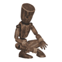 Sits cross-legged on the floor